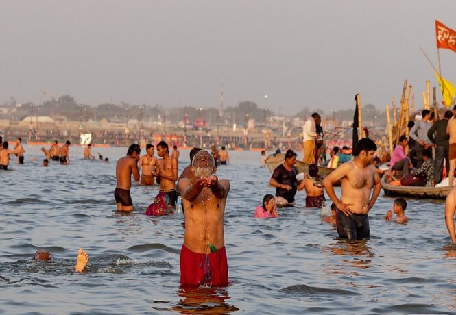 Hindu Pilgrims in the river at the Kumbh Mela Festival