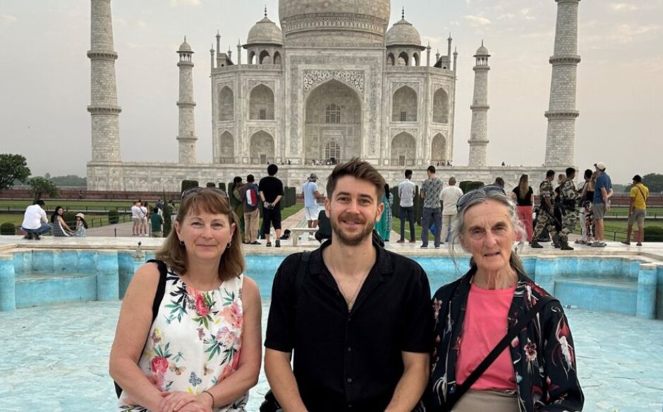 A picture of Susan and her family on their North India trip outside the Taj Mahal